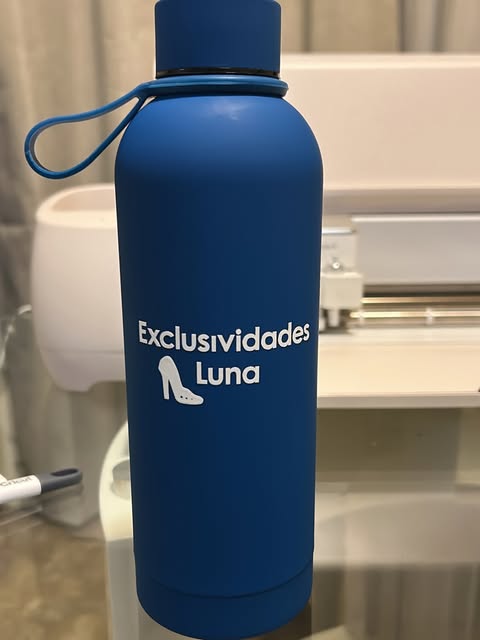 Blue water bottle with a business logo decal