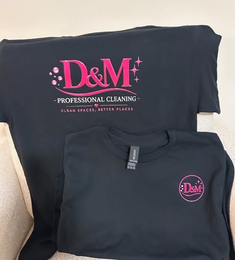 Black shirts with pink custom logo for a cleaning business