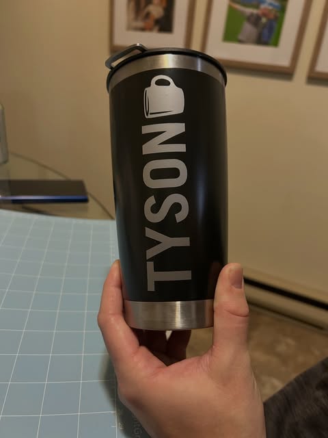 Black tumbler with a custom name and mug icon